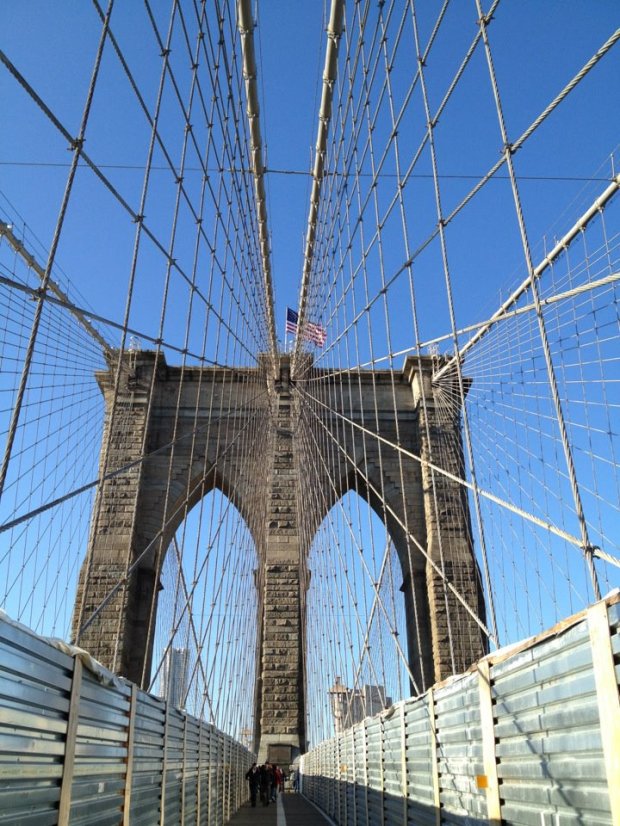Strolling across the Brooklyn Bridge